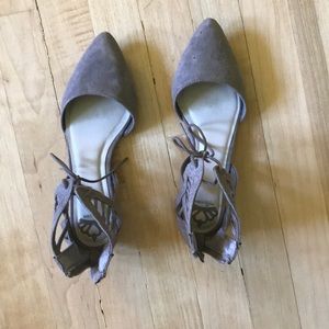 Zip on flats with cut out and tie detail at ankle